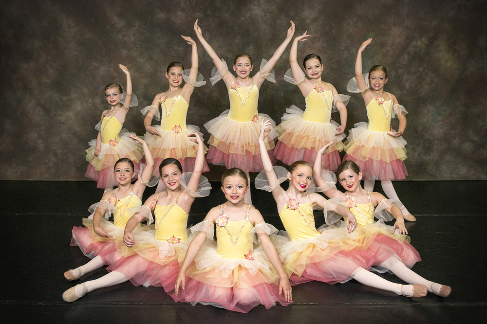 dance group posing for camera